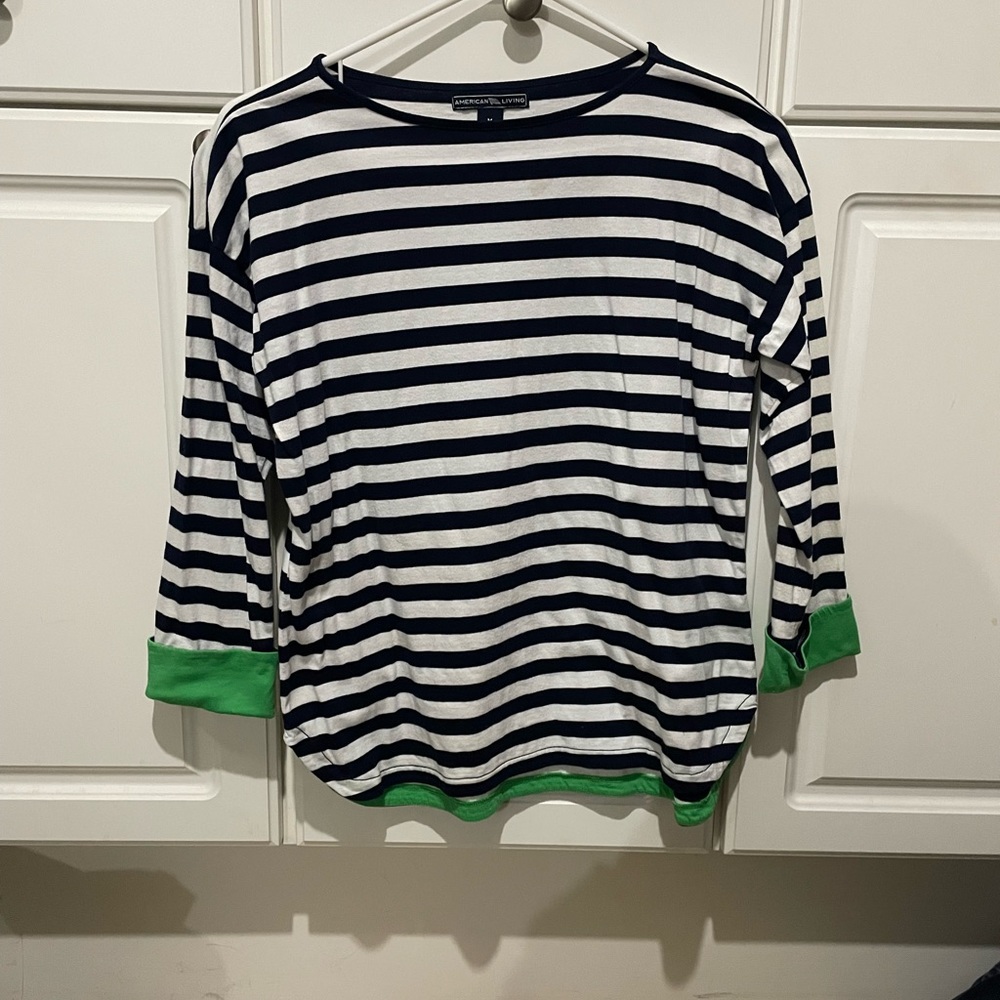 Women’s medium three-quarter length top. Cuffs different color.